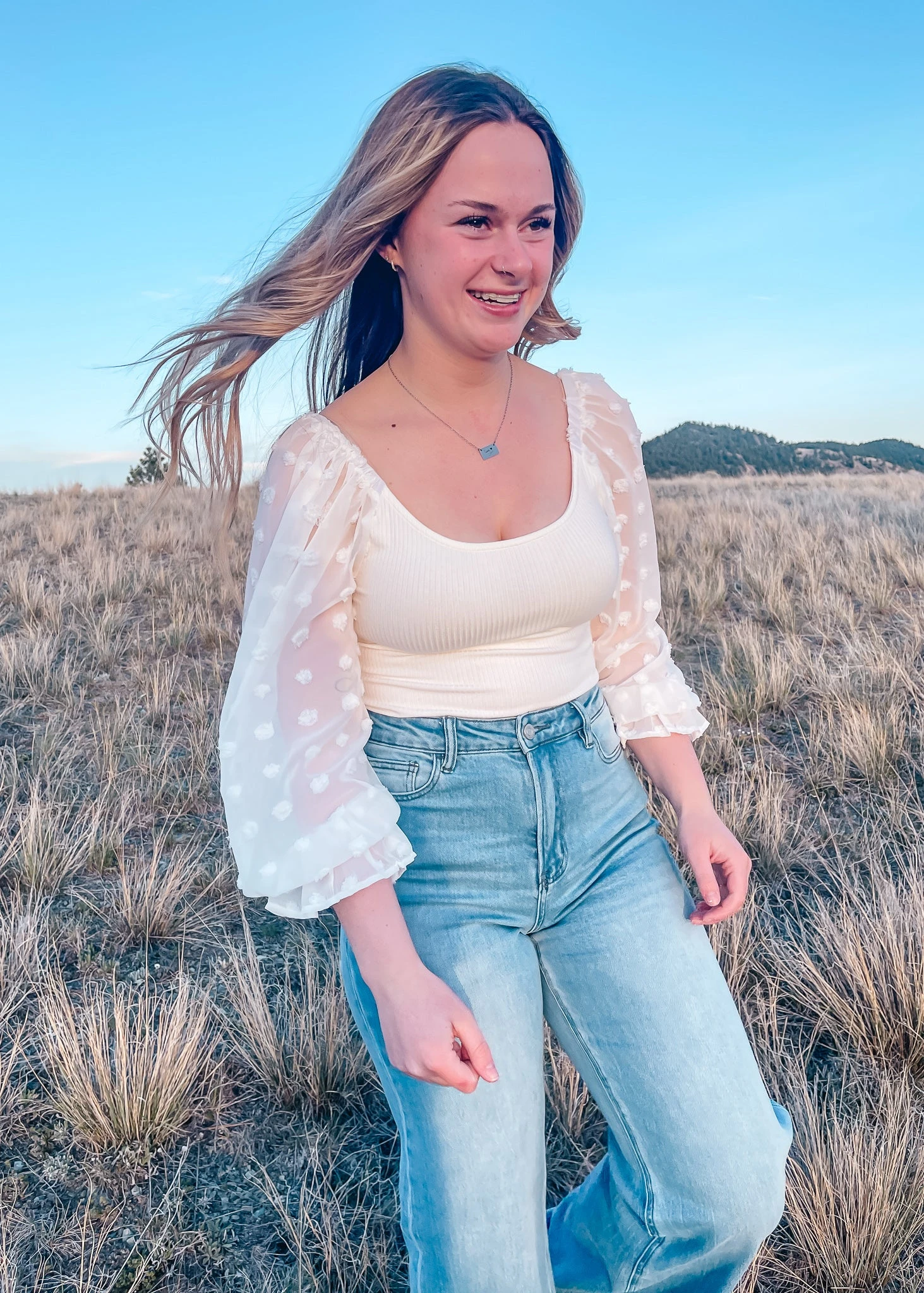 Long sleeve white bodysuit